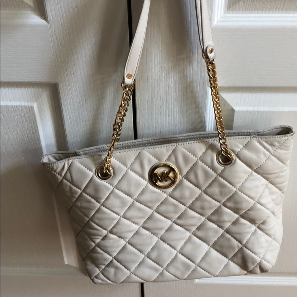 Authentic Michael Kors purse with wallet
